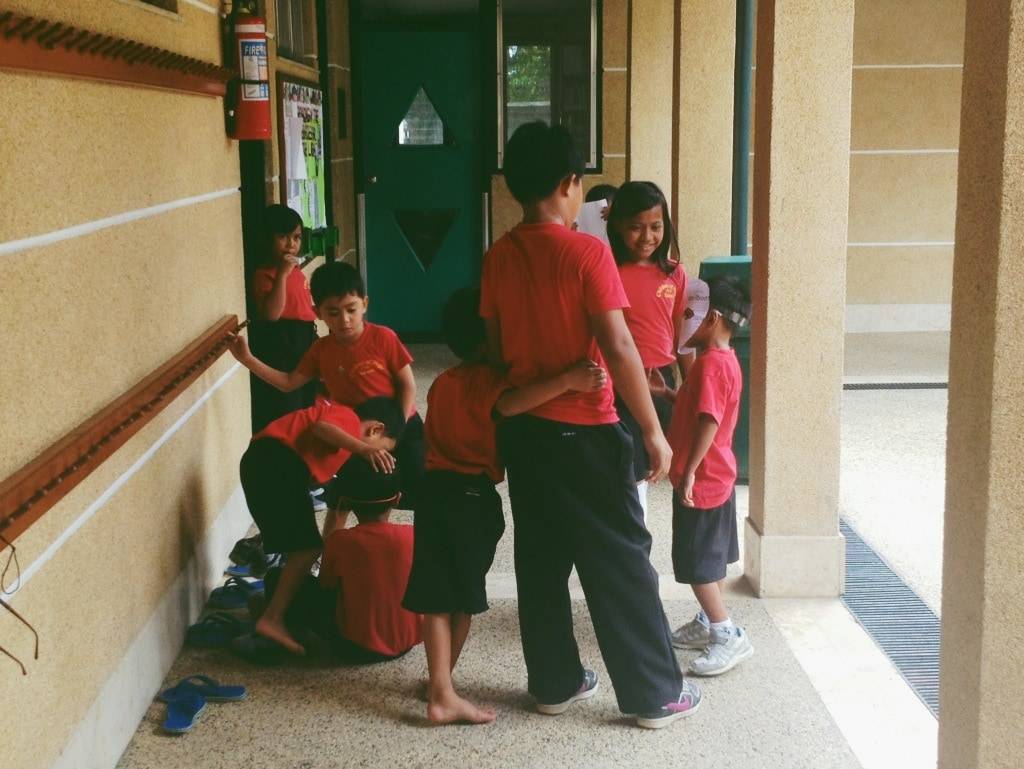 Children in red shirts.